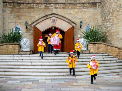 Setting off from Saint Hill to deliver the presents to a nearby children’s hospital