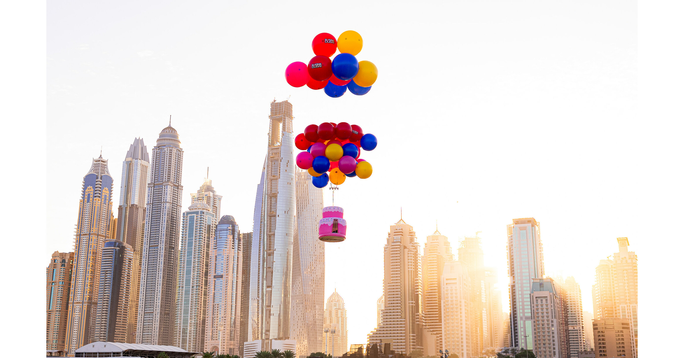 Skydive Dubai celebrated its 13th Anniversary with a flying cake, balloons, and a unique jump