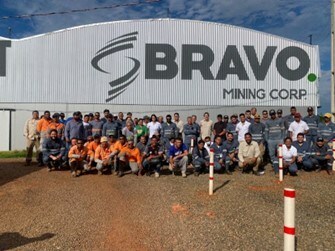 Figure 5: Team Bravo in front of the newly built core facility (CNW Group/Bravo Mining Corp.)