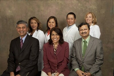 Back row from left to right: Maria Ampudia PA-C, Karen Dawson PA-C, Jim Colinco PA-C, Sharon Westerberg PA-C Front row from left to right: Dr. Ajit Maniam, Dr. Veena Charu, Dr. Jayaram Bharadwaj