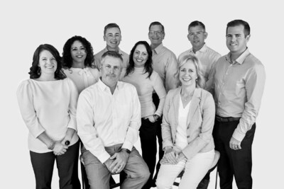 Ledge Wealth Management. Seated - Kurt Durrwachter, Gina Bartell. Standing from left to right - Robin Schaa, Sandra Middendorf, Seth Jungels, Chelsea Bentley, Kevin J. Kluesner, Sam Ronlund, Marshall Grams