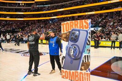 Image of a timeout during the Dallas Mavericks home game with a TORRAS sponsorship event