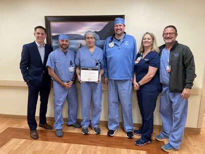 Presentation of the Orrum Center of Excellence Bronze Level Certification to the OR team at HCA Florida Fort Walton-Destin Hospital.

From left to right: Matt Wierzbowski (National Director at Orrum Clinical Analytics), Jamie Goldstein (Staff Perfusionist), Jim Bikakis (Staff Perfusionist), Michael Osborne (Director of Perfusion Services), Kelly Jordan (OR Director), Dr. Eric Sandwith (Chief Cardiovascular Surgeon).