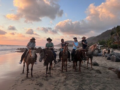 NextTribers on a sunset ride on the beach at Troncones, Mexico, 2023