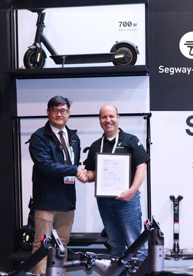 Jay Yang, Vice President of TÜV Rheinland Greater China Electrical, and Tom Hebert, VP of Sales, Segway Inc.
