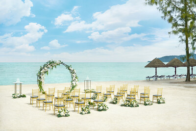 Cherish your special day with a breathtaking beach wedding against the backdrop of sun-kissed shores at Doubletree by Hilton Damai Laut Resort