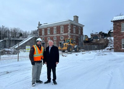 Terry Sheehan, Member of Parliament for Sault Ste. Marie and Parliamentary Secretary to the Minister of Labour and Seniors (right) and Brendan Hodgson, Technical Services Officer for Parks Canada (left), in front of the Powerhouse building site at the Sault Ste. Marie Canal National Historic Site.  Credit: Parks Canada (CNW Group/Parks Canada)
