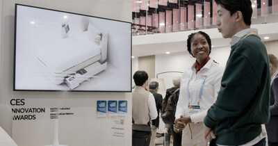 CES 2024 attendee learning about CERAGEM Co., Ltd. home health devices.