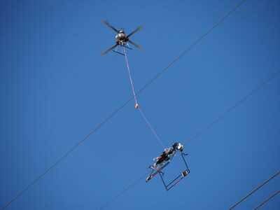 Utility lineworkers utilize the Mini LineFly™ to install PLP BIRD-FLIGHT™ Diverters on overhead power lines