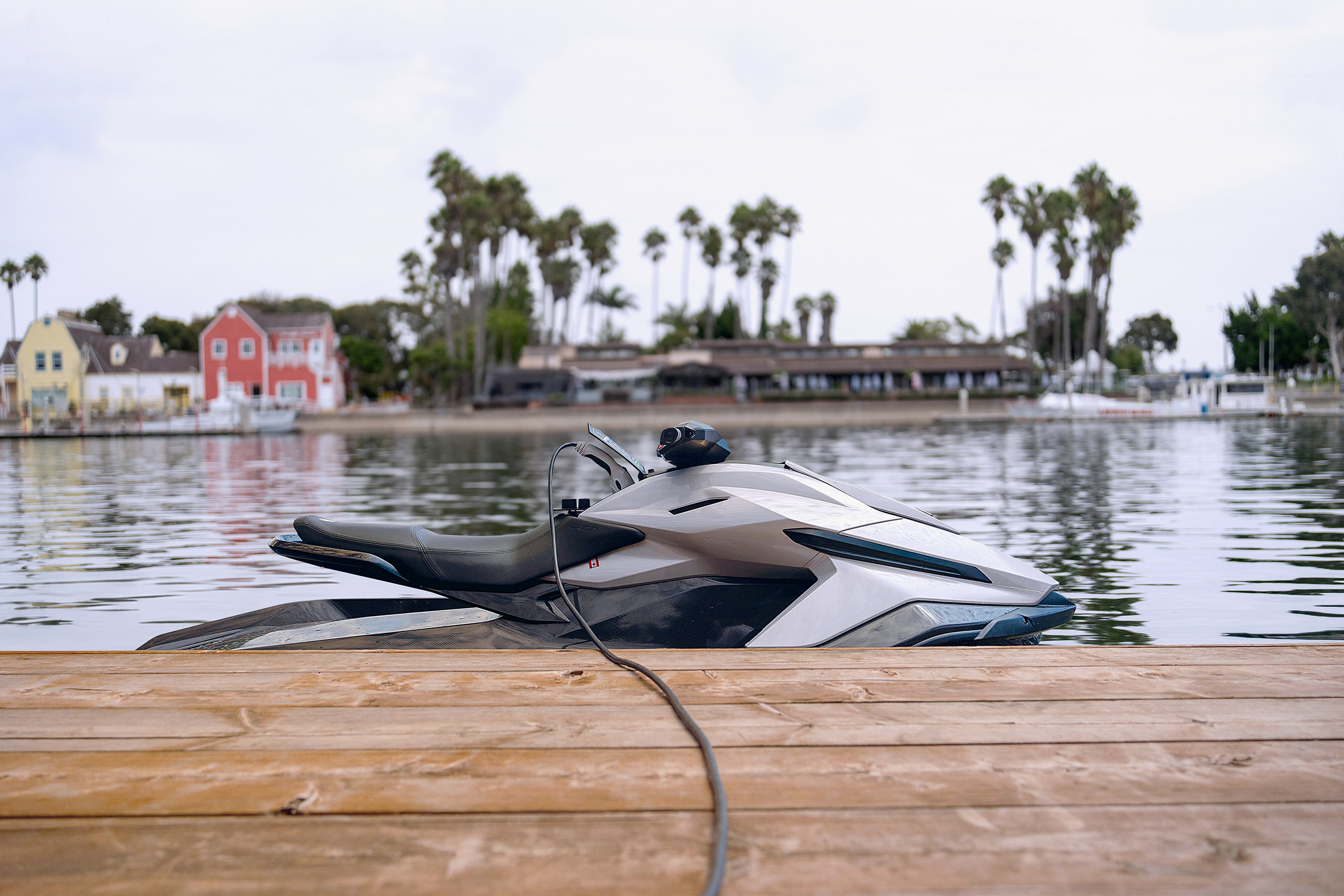 Taiga's 100% electric personal watercraft charging at the dock (CNW Group/Taiga Motors Corporation)