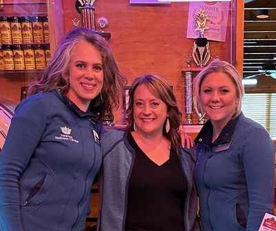 Sara Downs, AuD and ATA board member, with Melanie Lundell, L, and Laura Carlson at Texas Roadhouse in Duluth, MN, for the 2023 Tinnitus Awareness Day fundraiser.