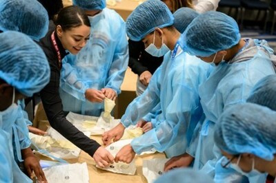 Students scrubbed in as vets for hands-on training during the annual blendVET event