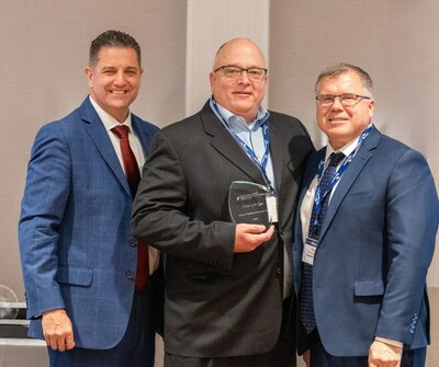 Sprague's David Pickens, Sales Director for Natural Gas, and Peter Jagodzynski, Energy Portfolio Manager, accept NYSHTA's Partner of the Year Award from association President Mark Dorr. This award recognizes Sprague as a dedicated industry supplier and trusted resource to NYSHTA's 1,000 members, and is awarded to a partner who has gone above and beyond in providing outstanding services to the industry.