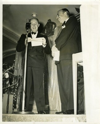 Christian Dior Accepting the Neiman Marcus Award from Stanley Marcus, 1947 - Courtesy of SMU
