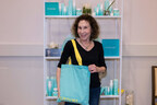 Former Cheers star Rhea Perlman poses with luxury Purdori skincare in the Emmy's Giving Suite.