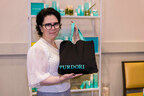Alex Borstein from The Marvelous Mrs. Maisel is gifted Purdori skincare in the Emmy's Giving Suite by Backstage Creations.