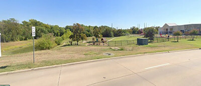 The playground at Miss Bloomingdale's Academy is located on a busy road, just steps away from the Trinity Elm Fork River. A lawsuit states a 2-year-old girl was was neglected and her life put in danger by the daycare center when  she was able to walk out of the classroom, open a back door that led to the playground, and exit the facility without anyone at the daycare center noticing she was gone for an extended amount of time.