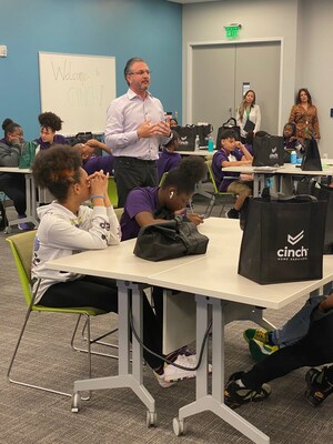 Orange Bowl Leadership Academy students enjoy activity hosted by Chief Growth Officer Doug Stein during annual field trip at Cinch Home Services' headquarters