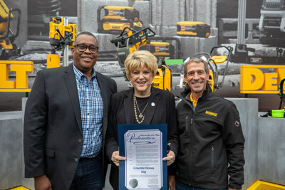 Las Vegas Mayor Carolyn G. Goodman, center, and City Councilman Cedric Crear, left, present a proclamation to Frank Mannarino of Stanley Black & Decker at the World of Concrete tradeshow, naming Jan. 23 as Concrete Heroes Day.