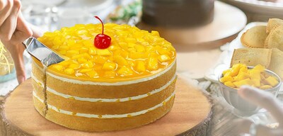 Red Ribbon's best-seller, Mango Supreme Cake, is made with the Philippines’ best mangoes. It features three-layer white chiffon cake with fluffy cream and a golden mango glaze between each layer, which is then topped with mango chunks and a maraschino cherry.