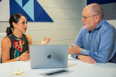 SCORE mentor Mark Lancaster (right) provided guidance to Amanda Chavero as she opened her own business in 2019.