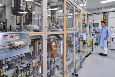 An employee monitors progress of fuel cell electrodes in the stack assembly room at Fuel Cell System Manufacturing LLC, GM and Honda’s fuel cell joint venture in Brownstown, Michigan