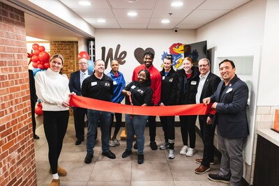 Wendy’s celebrates new restaurant opening inside the University of Kansas Student Union with student athletes and university officials.