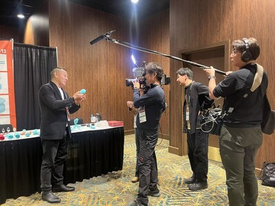 ANDRE is interviewed by dozens of media reporters.
