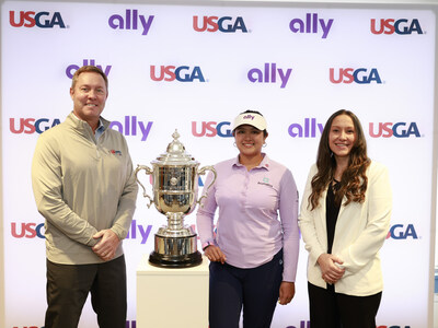 Mike Whan, CEO of USGA, Lilia Vu, the world's top women's golfer, and Stephanie Marciano, head of sports marketing at Ally with the U.S. Women's Open trophy in New York City announcing Ally’s sponsorship as the official retail banking partner of the USGA.