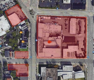 An overhead view of the 4 parcels acquired in the purchase, shaded in red.