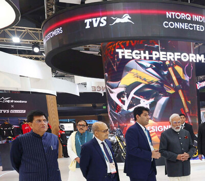 Hon’ble Prime Minister Shri Narendra Modi, Mr. Piyush Goyal – Minister of Commerce, Mr. Sudarshan Venu, MD, TVS Motor Company at TVS Motor Pavilion at Bharat Mobility Global Expo 2024. Photo Credit: PMO (PRNewsfoto/TVS Motor Company)