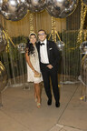 Akel Homes President and his wife pose for a photo at the 2024 LLS Dare to Disco Black Tie Gala.