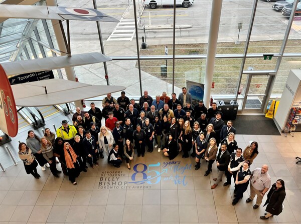 PortsToronto and Billy Bishop Toronto City Airport staff gather to launch a celebration to mark 85 Years of Flight at Toronto’s downtown airport. (CNW Group/PortsToronto) PortsToronto and Billy Bishop Toronto City Airport staff gather to launch a celebration to mark 85 Years of Flight at Toronto’s downtown airport. (CNW Group/PortsToronto)
