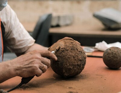 Iron round shot (cannonball) during conservation in the laboratory of JHD's General Department of Archaeology.