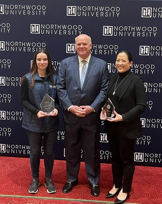 Cox Automotive CEO Steve Rowley (middle) presents Northwood University student Hayden Wilburn (left) the $10,000 Barbara Cox Scholarship Award and Tina Miller (right), senior vice president and chief financial officer at Lithia and Driveway, the Barbara Cox Woman of the Year Award.