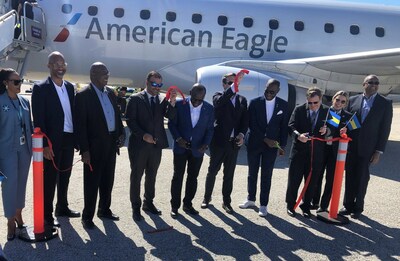 Deputy Prime Minister I. Chester Cooper, the Hon. Clay Sweeting, Minister of Works and Family Island Affairs, alongside American Airlines and Governor's Harbour Airport executives cut the ribbon for the inaugural twice-weekly nonstop service between Miami and Governor's Harbour, Eleuthera.