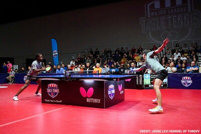Jiwei Xia (right) of the Portland Paddlers returns a serve from Olajide Omotayo of the Seattle Spinners at MLTT's Week 9 event in Portland, OR. Photo by Jesse Levi Hummel of Throvv.