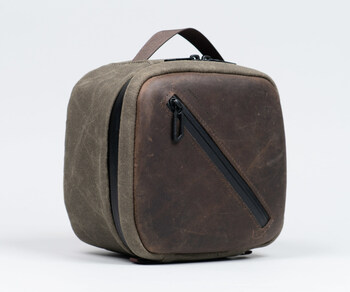 Vision Pro Shield Case in waxed canvas and full-grain, distressed chocolate leather