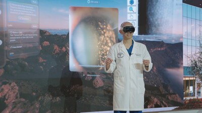 Tommy Korn, MD, board-certified ophthalmologist with Sharp Rees-Stealy Medical Group, demonstrates potential clinical uses of Apple's new Vision Pro at Sharp's Prebys Innovation and Education Center.