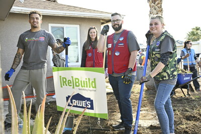 Professional football player Chase Brown with Lowe's employee volunteers
