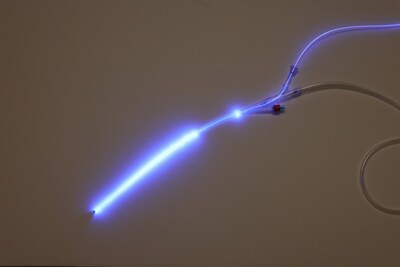 The ABL light fiber emits specific antimicrobial frequencies of blue light within and around catheters.