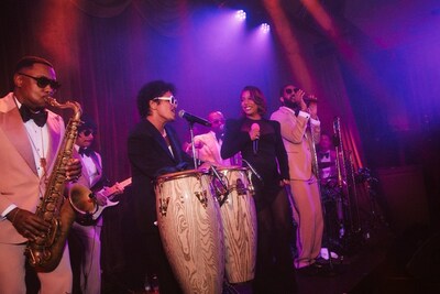 Victoria Monét performs with Bruno and The Hooligans during the reveal of The Pinky Ring at Bellagio Resort & Casino.