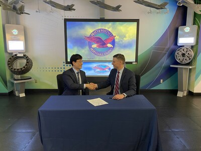 Chris Johnson, vice president of Fighter and Mobility Programs at Pratt & Whitney (right), and Director General Lee Gui-Hyun (left) sign the third consecutive performance-based logistics contract that Pratt & Whitney and DAPA have signed since 2012, offering on-going maintenance support for the Republic of Korea Air Force's F-15 Eagles and F-16 Fighting Falcons.