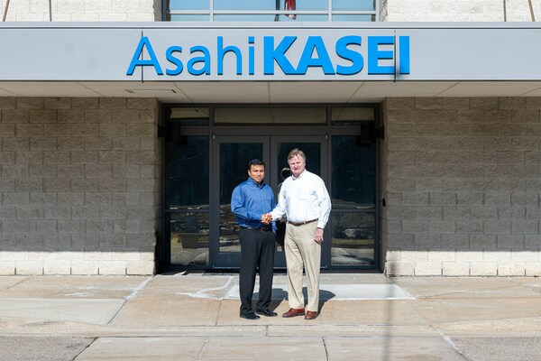 Phani Nagaraj (left) and Todd Glogovsky (right) in front of Asahi Kasei Plastics North America in Fowlerville, Michigan.