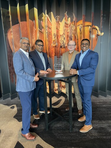 Key Members of the Resolve Tech Solutions Leadership Team accept Outstanding Partner Award from SAP NS2