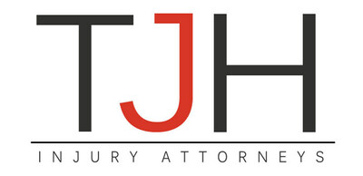 Logotipo de Thomas J. Henry