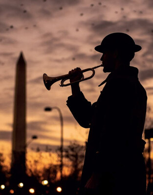 A bugler from the Doughboy Foundation plays Taps every day, rain or shine, at 5:00 PM Eastern at the National World War I Memorial in Washington, DC to honor Americans who served in World War I and all our nation's current service members and veterans everywhere. (Photo courtesy of Attila Szalay-Berzeviczy.)
