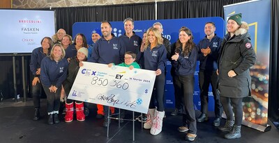 A record $850,360 was raised by the CHU Ste-Justine Winter Triathlon, putting smiles on the faces of co-presidents Catherine Sharp and Nicolas Croteau and their formidable campaign team. (CNW Group/CHU Sainte-Justine Foundation)