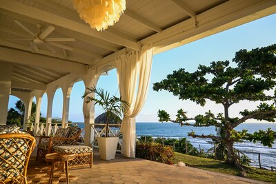 Image of the ocean and trees at MycoMeditations' luxurious retreat center on the beach.