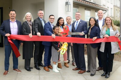 Riverside County and City of Beaumont officials join new residents and the Linc Housing team to celebrate the grand opening of The Blossom.